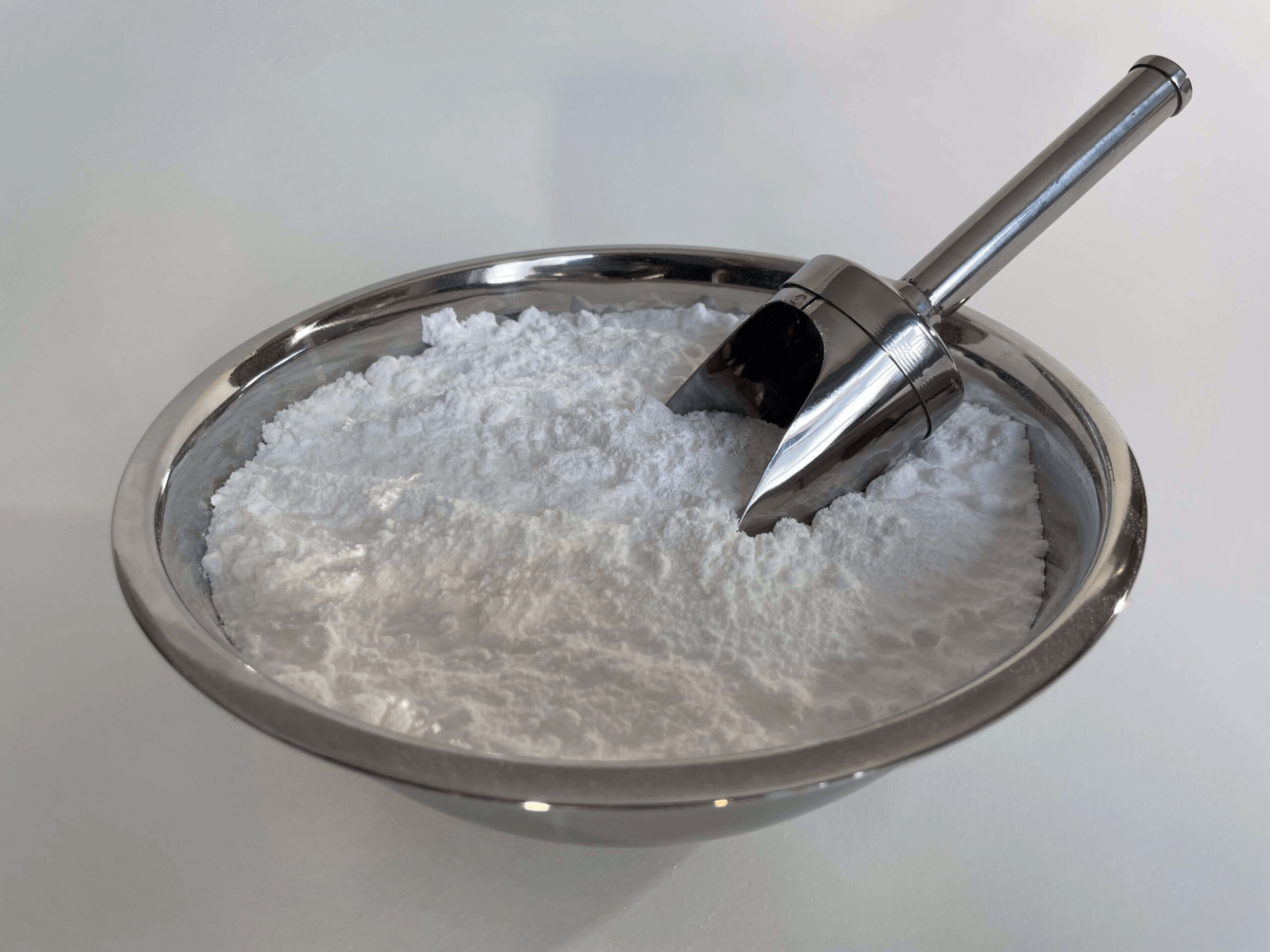 White powder in metal bowl | VELCARE (Caffeine)