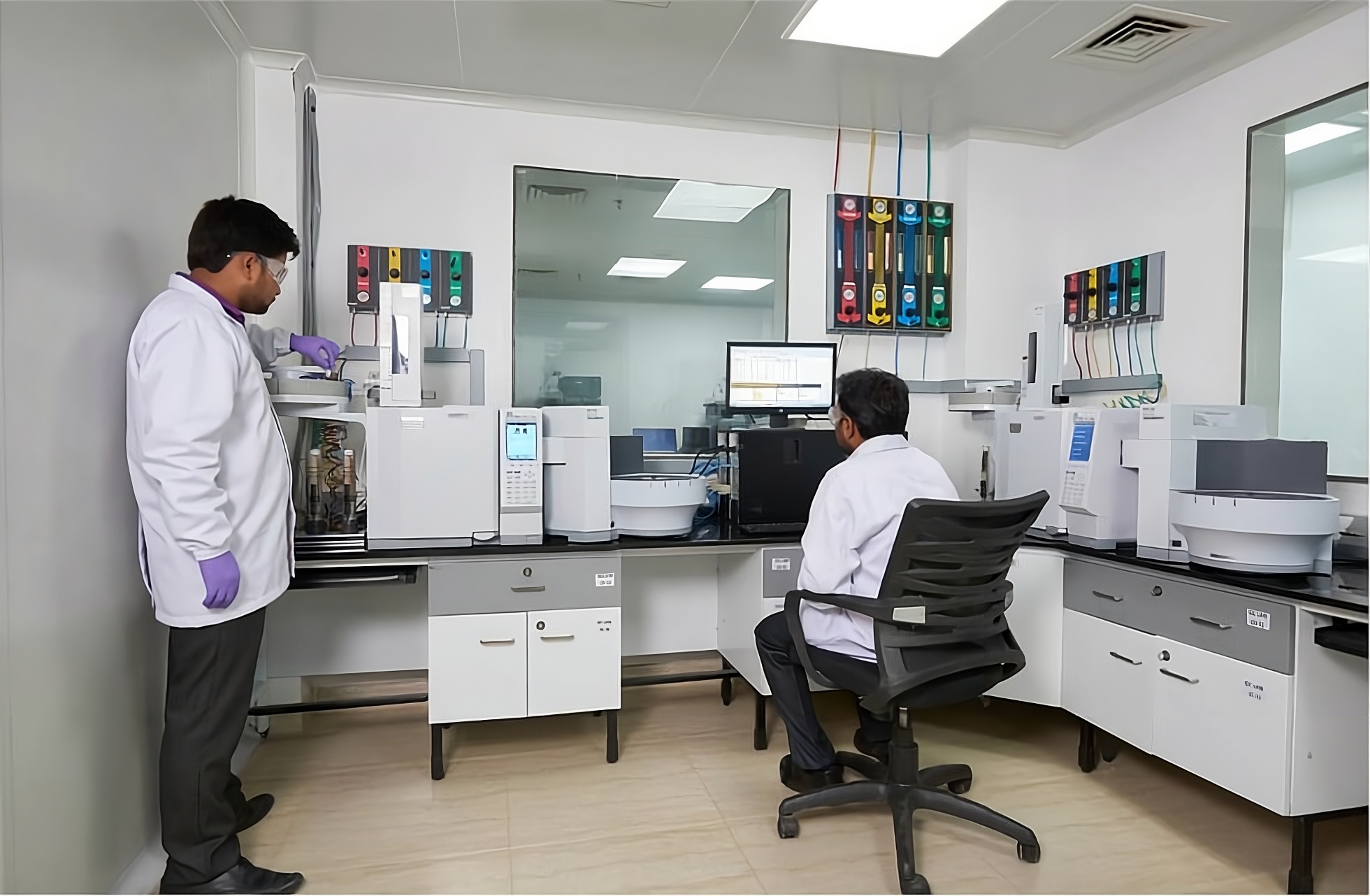 Scientists in a modern lab | VELCARE