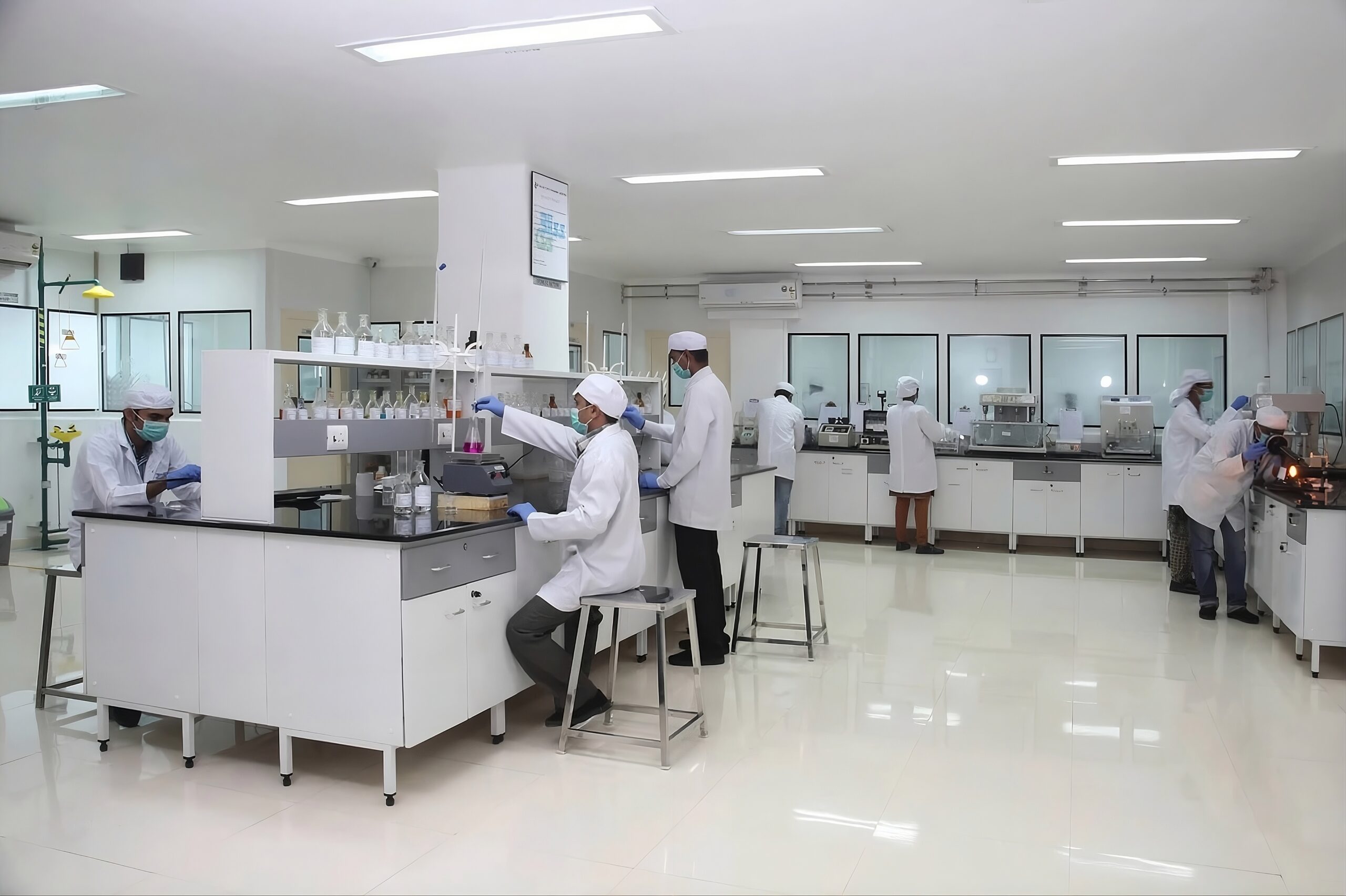 Scientists in a pharma lab | VELCARE